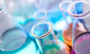 Dramatic close up photo of chemistry beakers